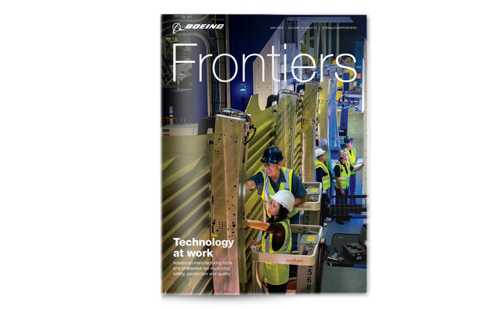 A Frontiers cover, Technology at work: employees in safety vests at work on aircraft assembly