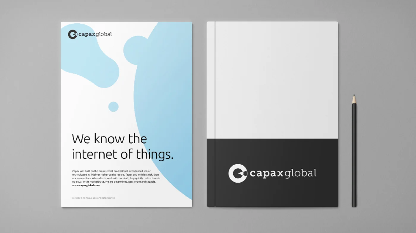 Option A on a brochure cover headlined We know the internet of things, beside a notebook